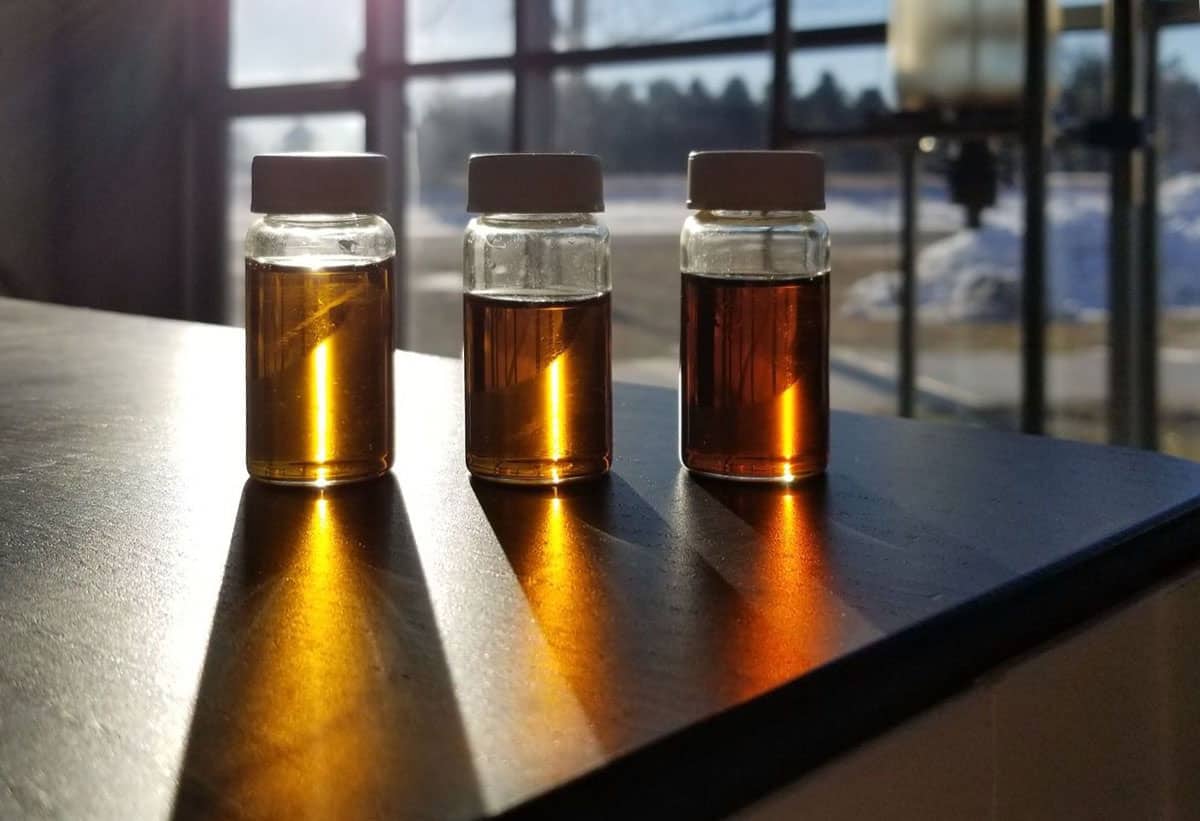 terpenes in small glass jars on table