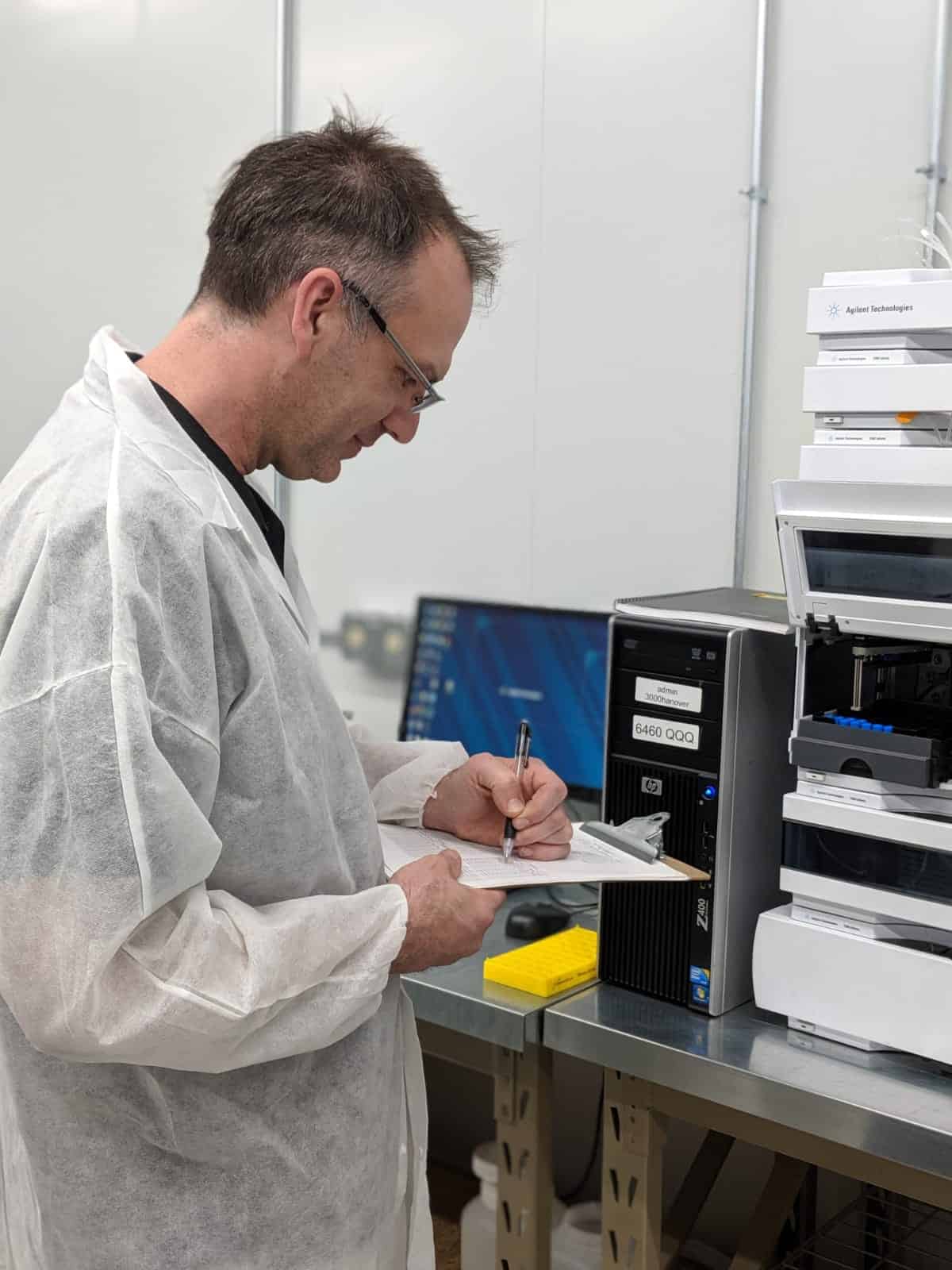 doctor writing in lab