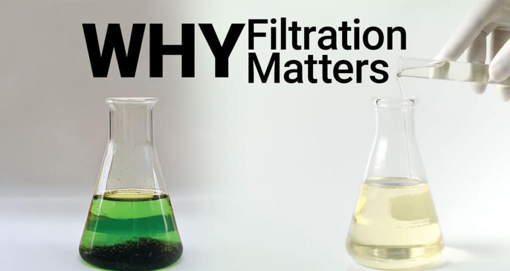 pouring oil from glass tube into science glass in labolatory on