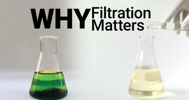 pouring oil from glass tube into science glass in labolatory on